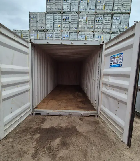 en 1