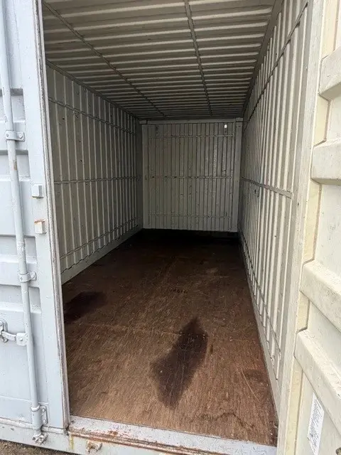 en 1