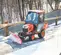 Tractor compacto KUBOTA naranja y negro de 24 – 25 HP